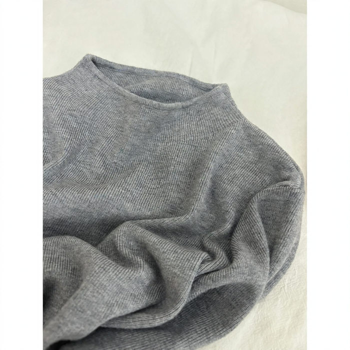Women's knit sweater with stand-up collar, solid color