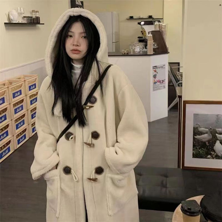 Long coat with toggles and lambskin look