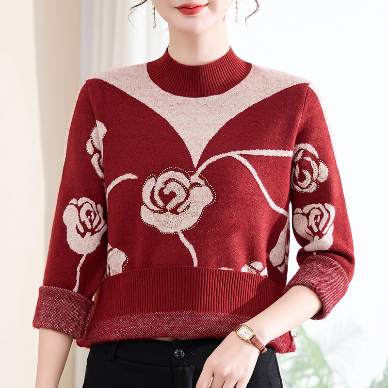Women's knit sweater with stand-up collar and floral pattern