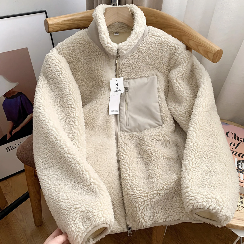 Casual women's jacket made of lambskin imitation with zipper