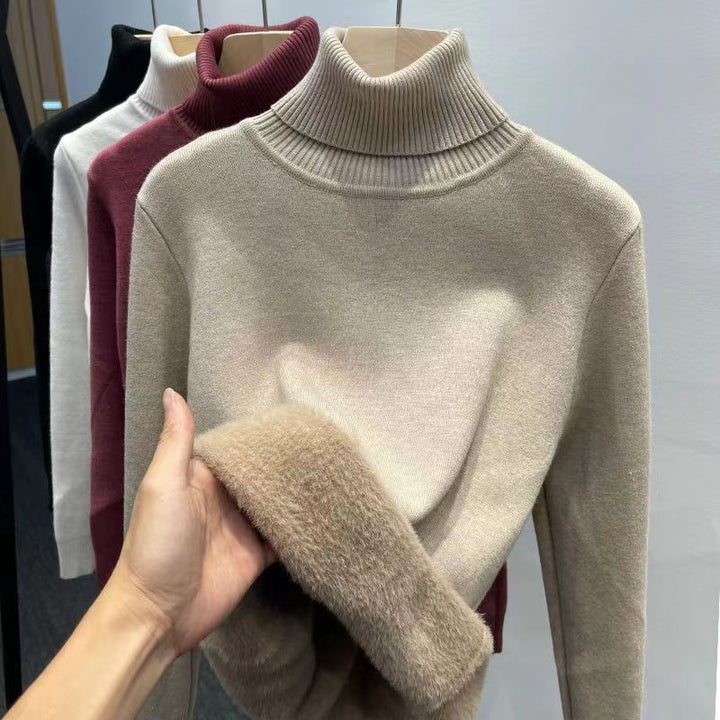 Padded women's knit sweater with high collar