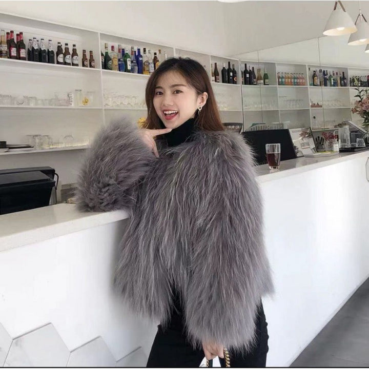 Modern faux fur jacket with asymmetric cut