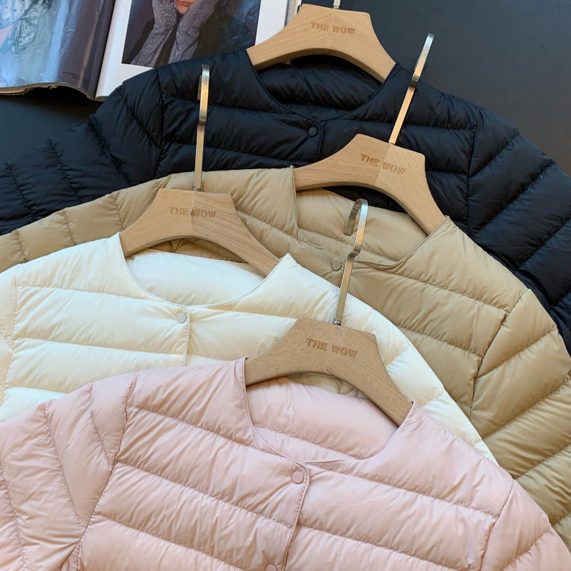 Light women’s down jacket, short, with goose feathers