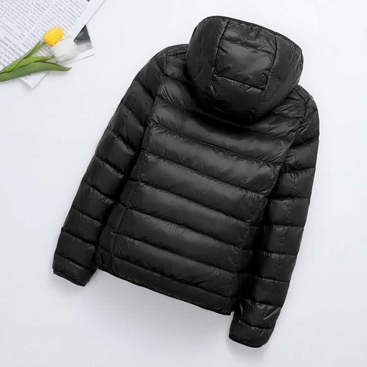 Light women's quilted jacket, short, with hood