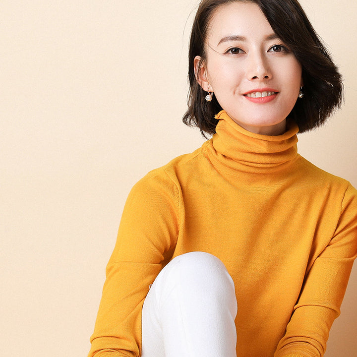 Women's knitted pullover with stand collar and geometric pattern