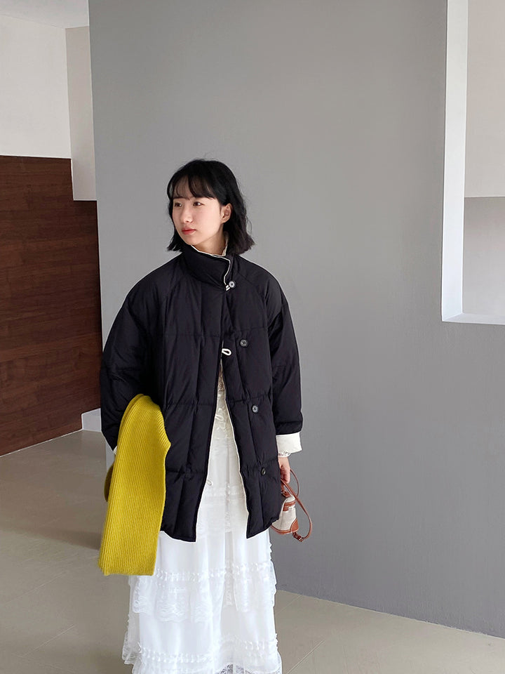 Reversible down jacket with stand-up collar