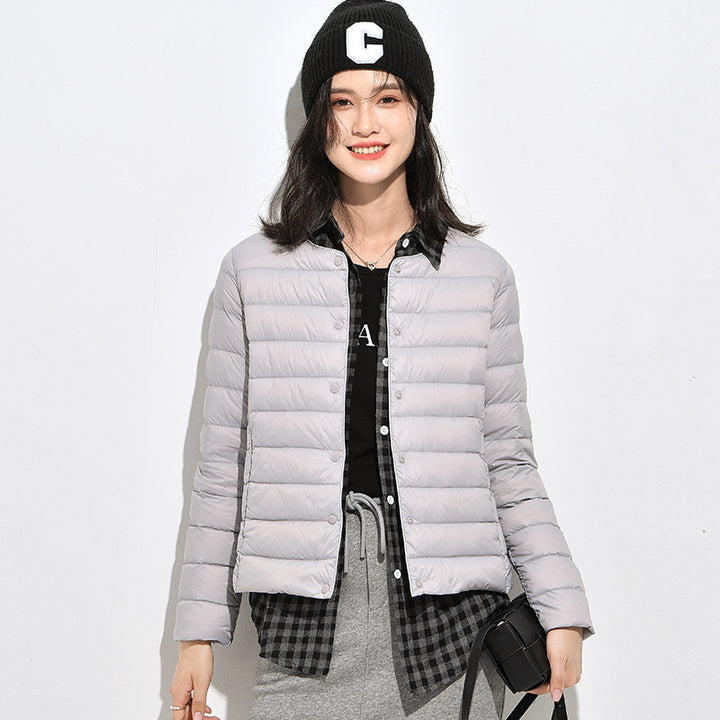 Light women's down jacket, short, as a base layer jacket