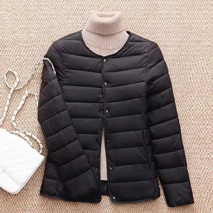 Light women's quilted jacket, short, fitted