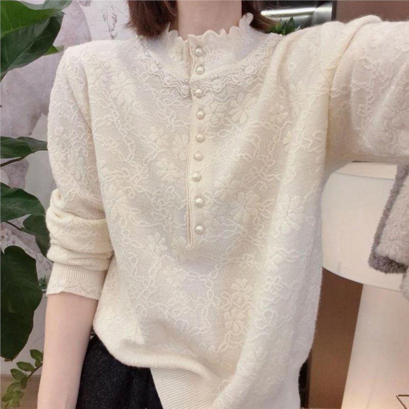 Women's knitted sweater with lace trim and pearls