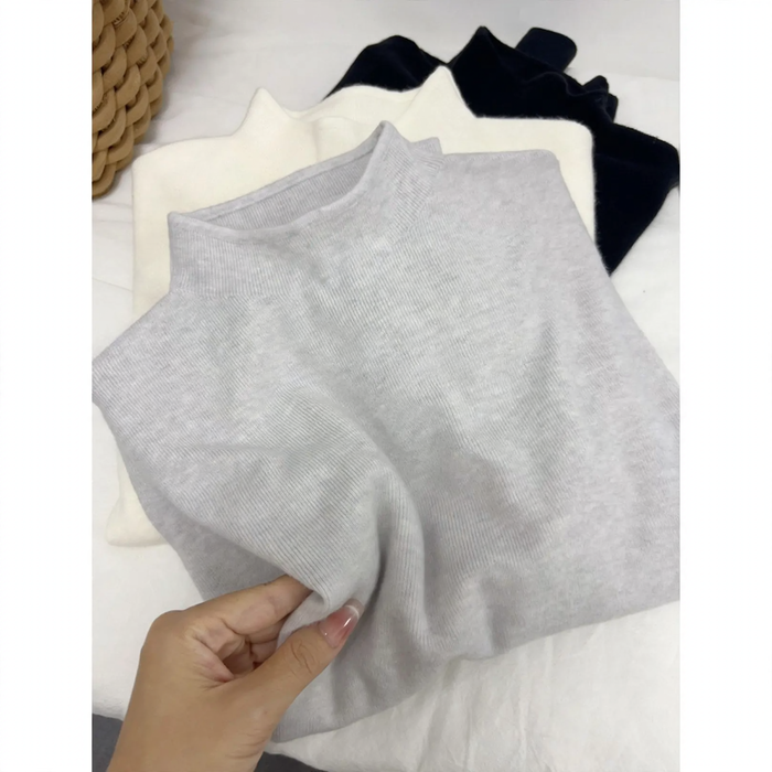 Women's knit sweater with stand-up collar, solid color