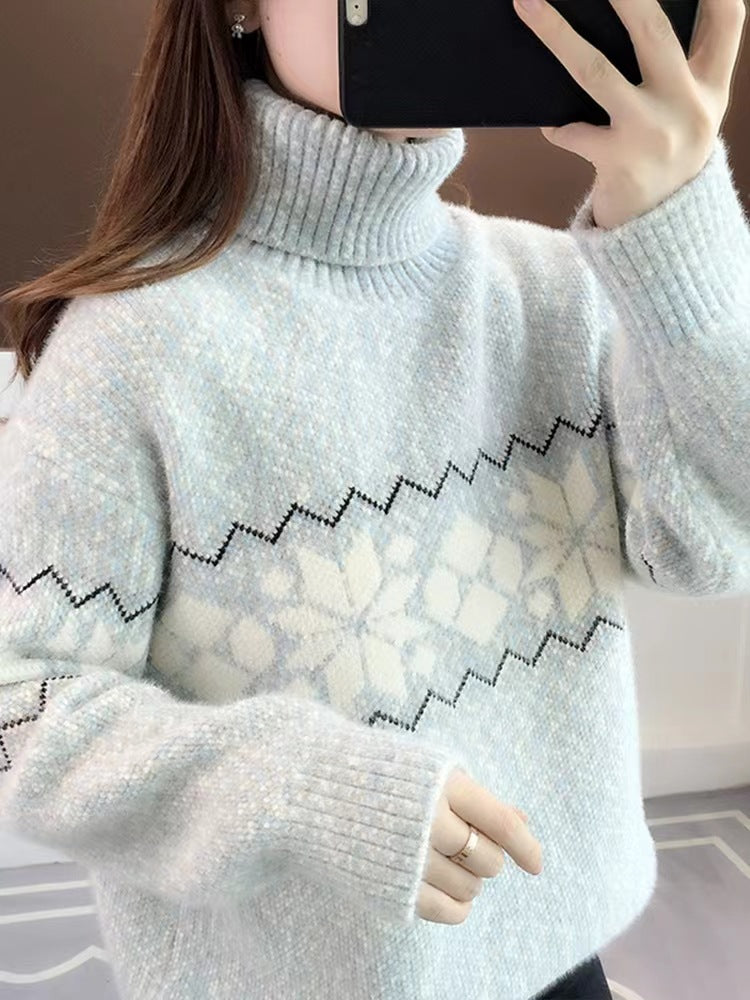 Women's knitted pullover with snowflake pattern and stand-up collar