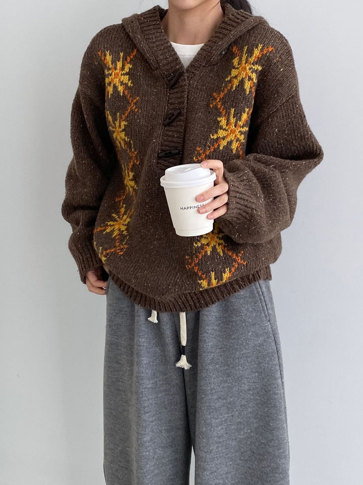 Hooded pullover with snowflake pattern, knitted
