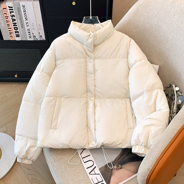 Short women's quilted jacket in a loose fit