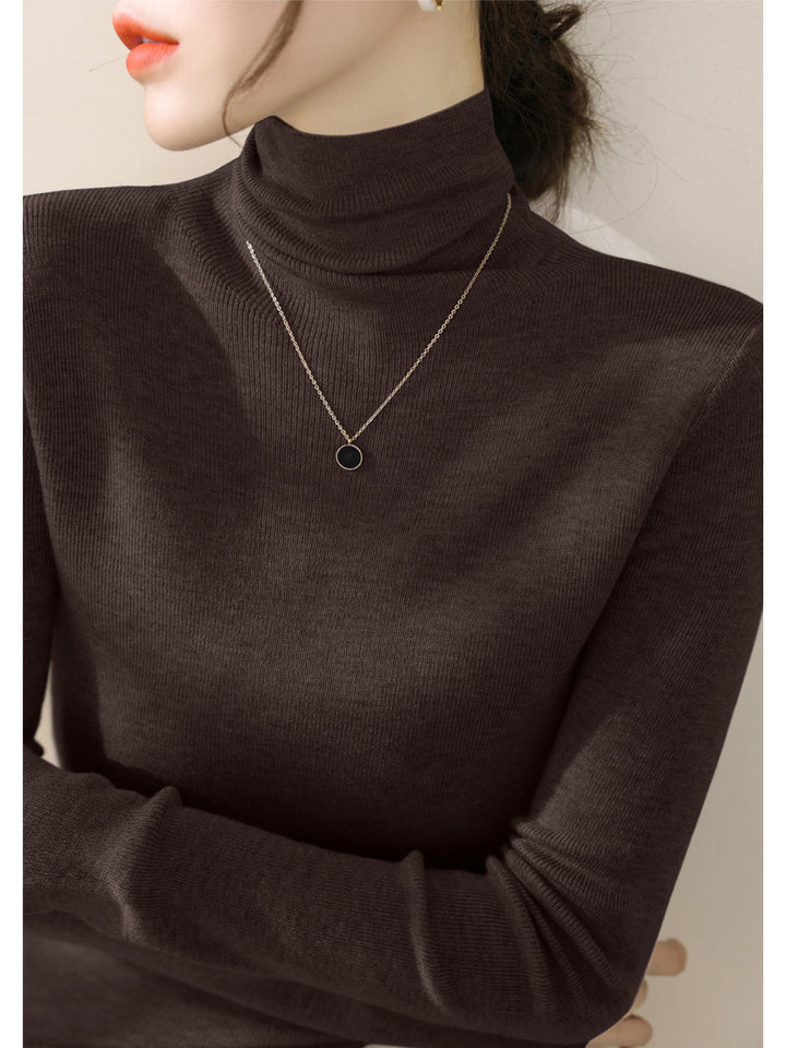 Women's knitted sweater, fitted, with stand-up collar