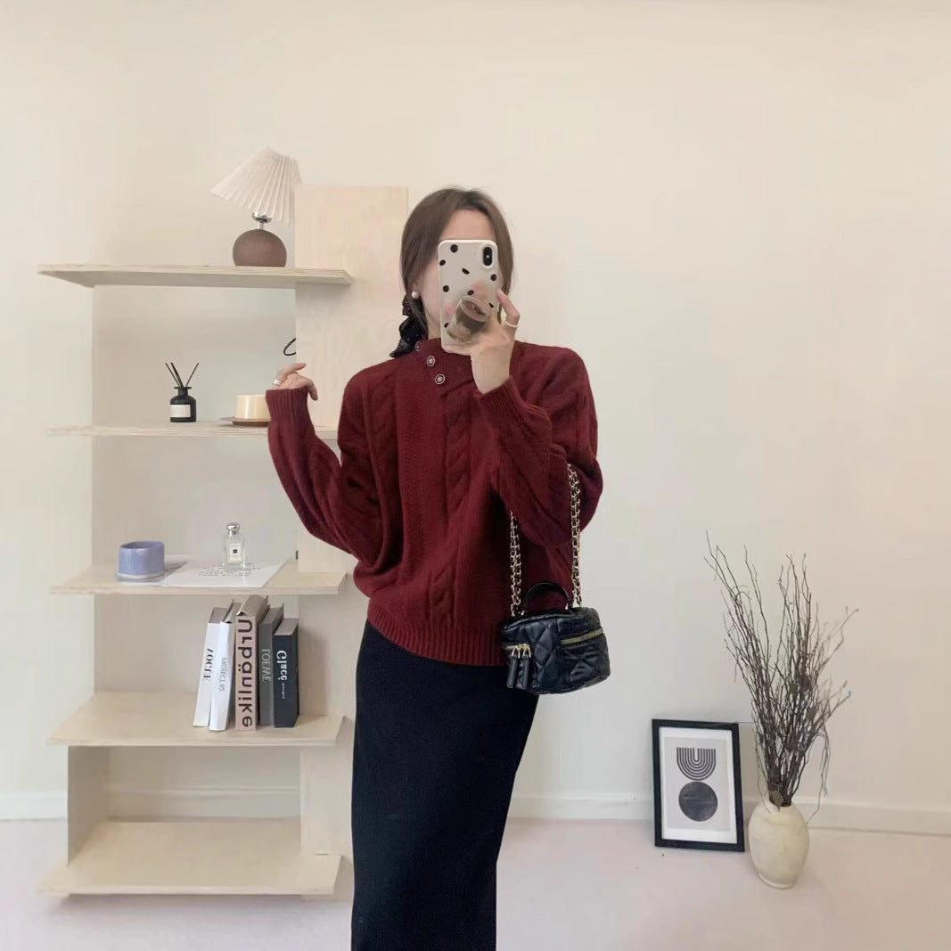 Short cable knit sweater with asymmetric neckline