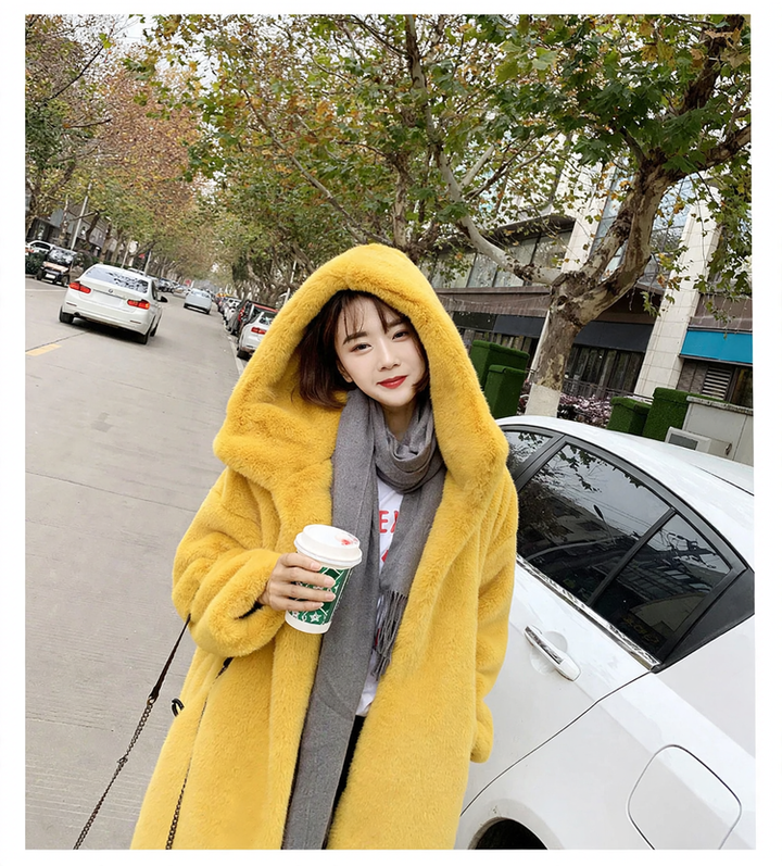 Long women's coat in faux fur with hood