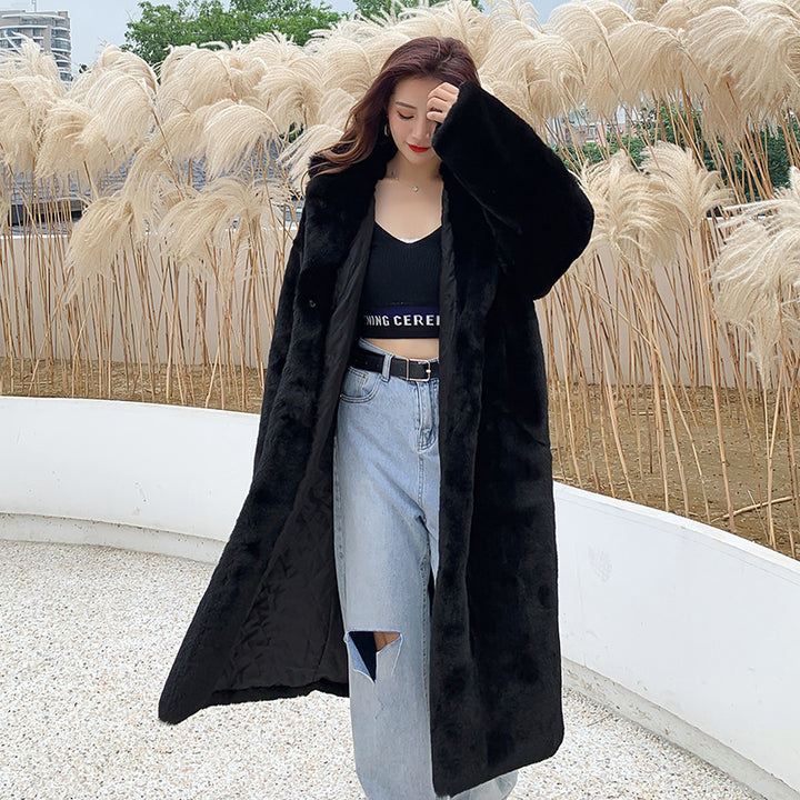 Long women's coat in faux fur with hood