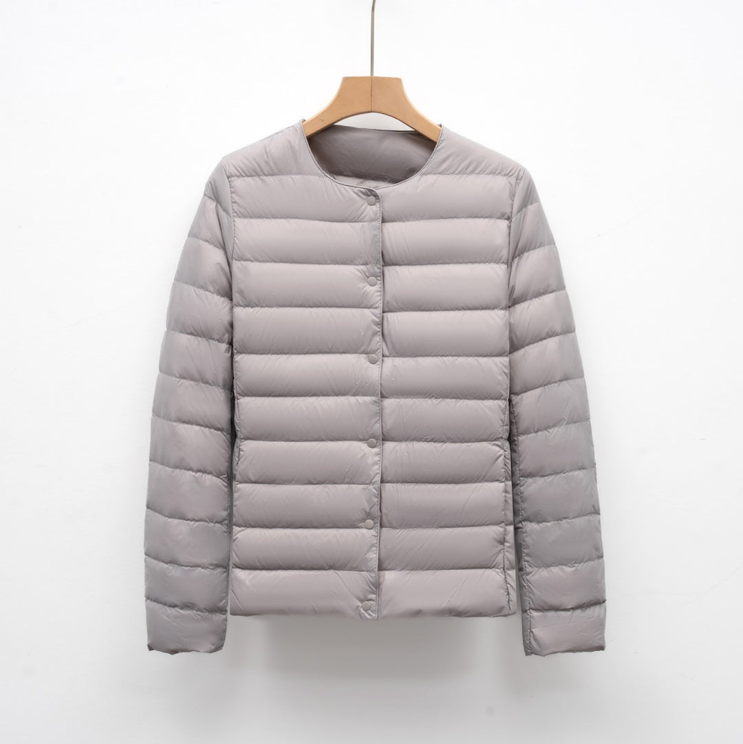 Light women's quilted jacket with round neckline