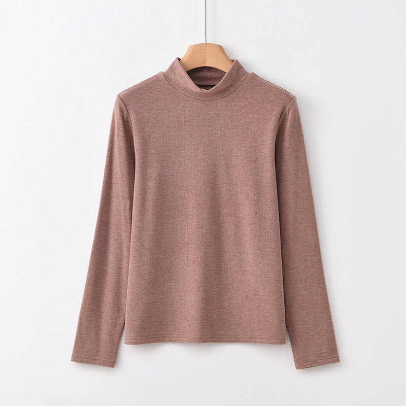 Warm knitted pullover with stand-up collar