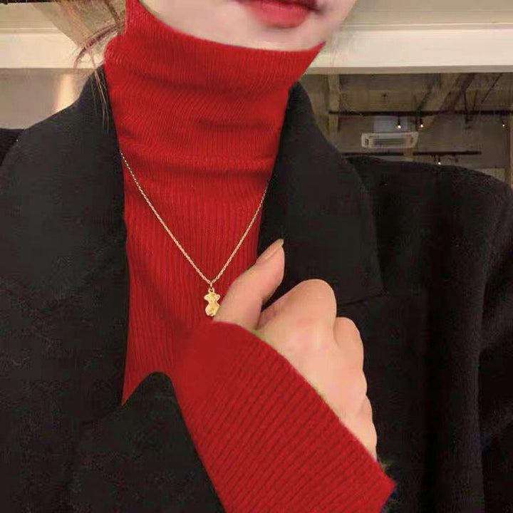 Narrow turtleneck knitted sweater