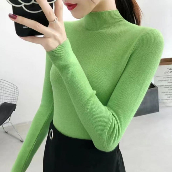 Women's knitted pullover with stand-up collar, fitted