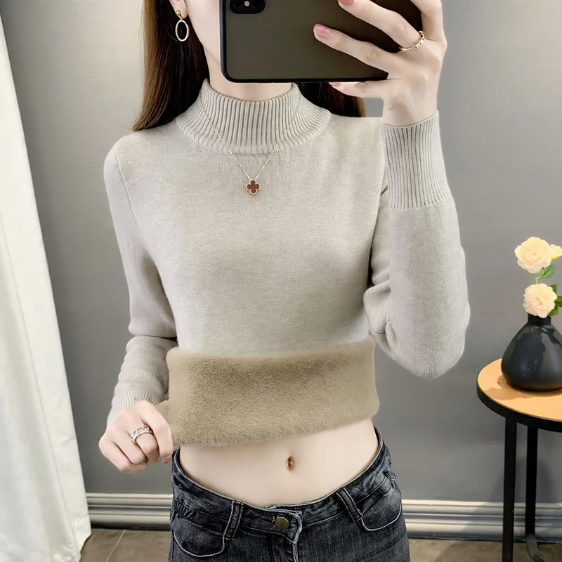 Padded women's knitted sweater for winter