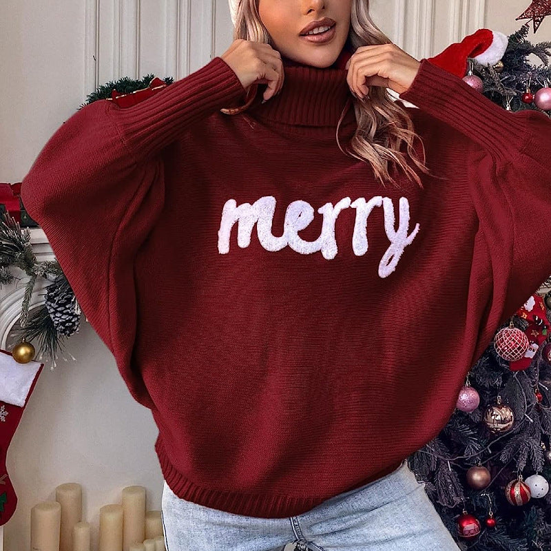 Women's knitted pullover with stand-up collar and embroidery
