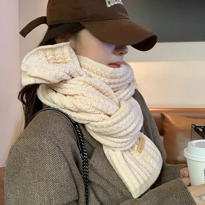 Soft knitted scarf, warming and versatile