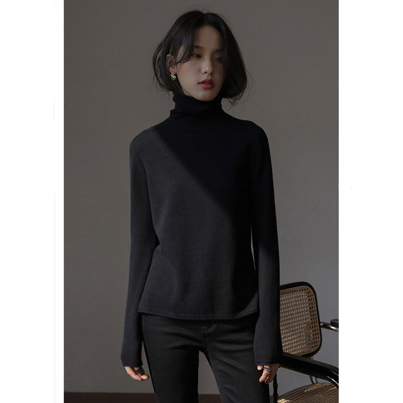 Women's wool sweater, stand-up collar, loose fit with slit