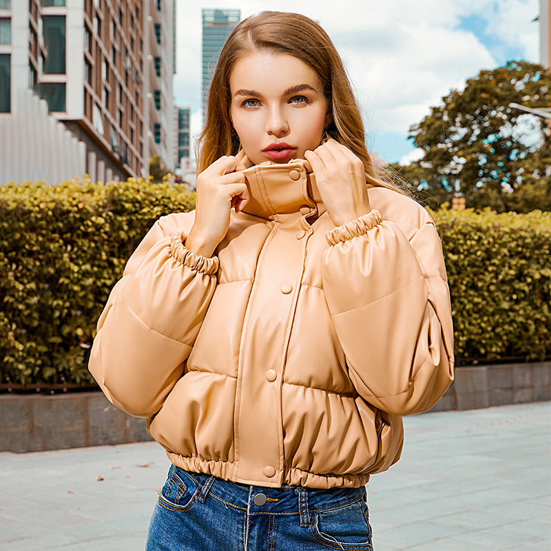 Short women's quilted jacket with stand-up collar, padded
