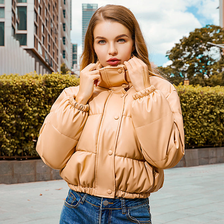 Short women's quilted jacket with stand-up collar, padded