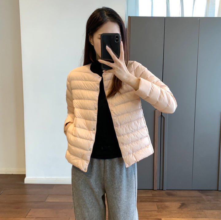 Light women's down jacket, short, with goose feathers