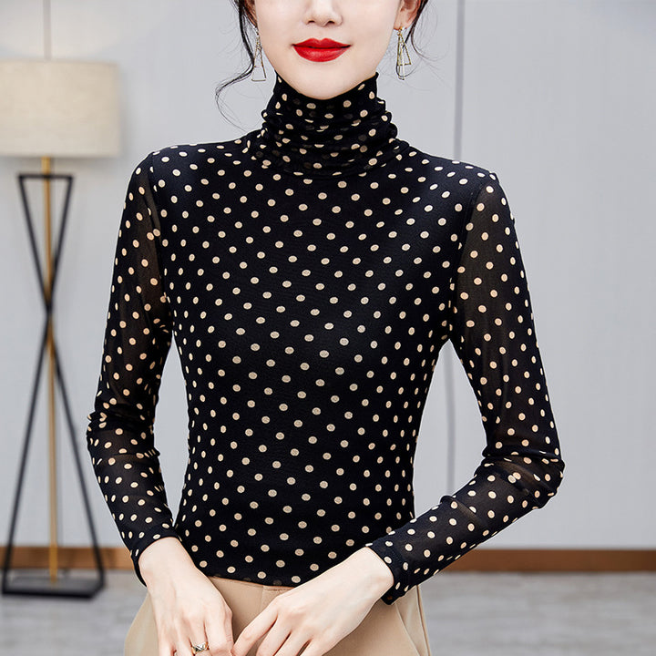Women's top with stand collar and polka dot pattern