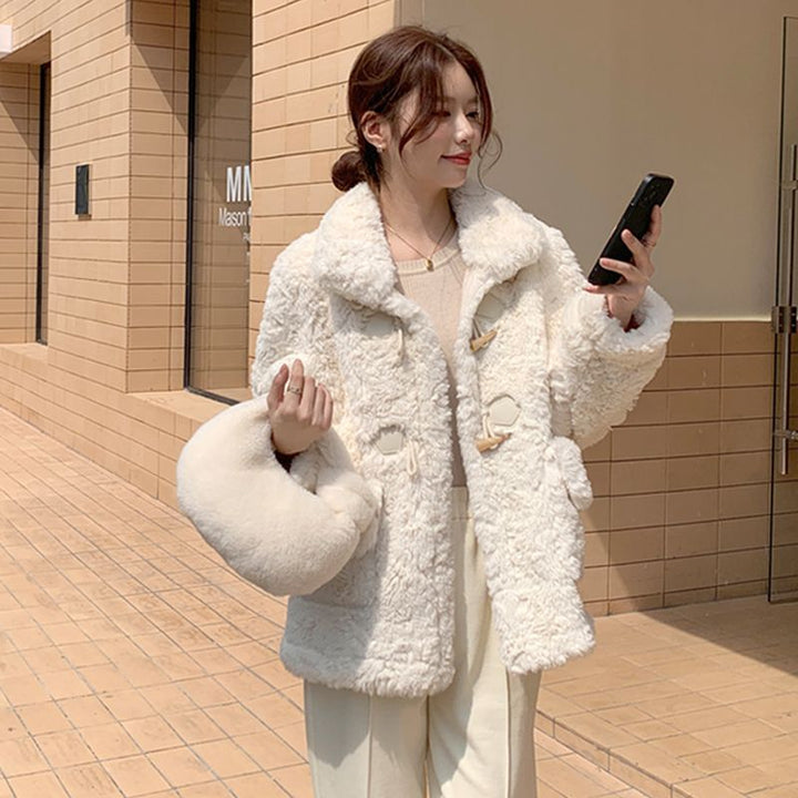 Women's winter coat with toggle closure and lambskin look