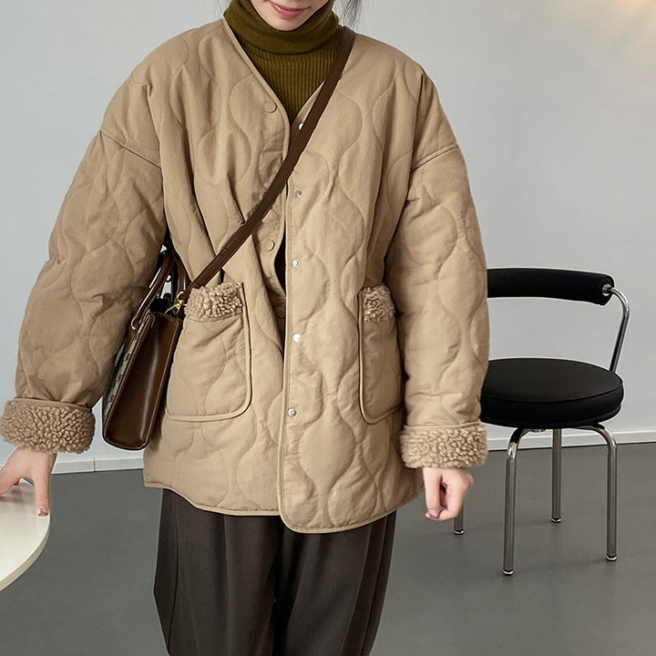 Women's quilted jacket with lambskin inserts and V-neck