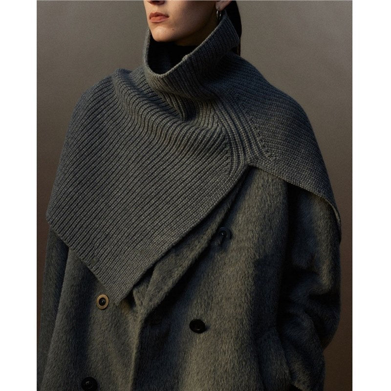 Knitted shoulder warmer made of merino wool with slit