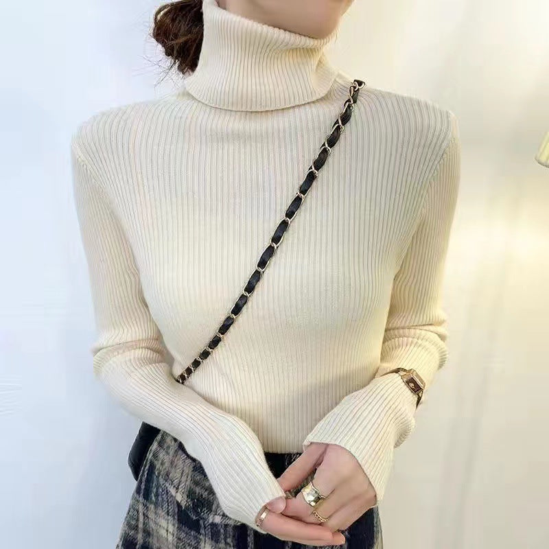 Form-fitting women's turtleneck sweater