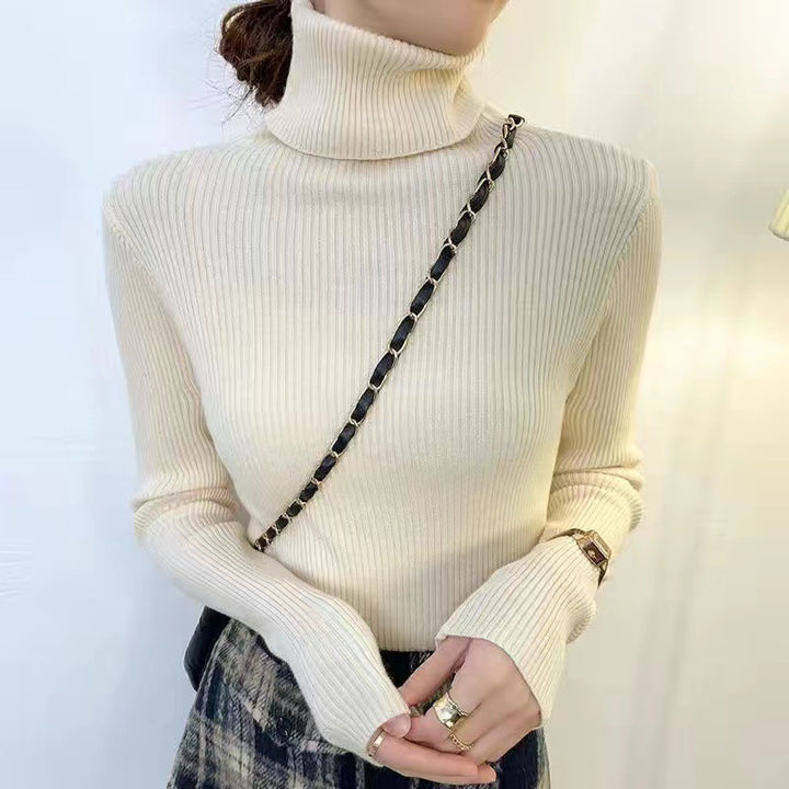 Form-fitting women's turtleneck sweater
