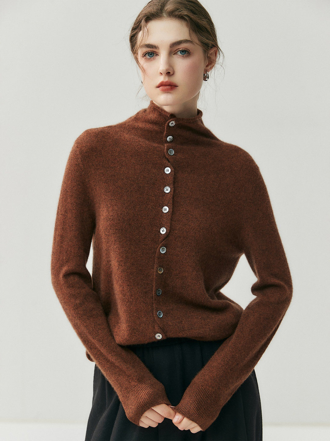 Women's cardigan with roll neck and button placket