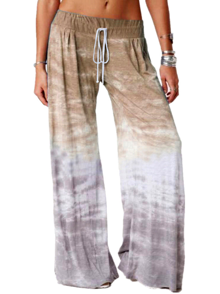 Ladies wide batik pants with drawstring, pleats, and side pockets Mune Fashion