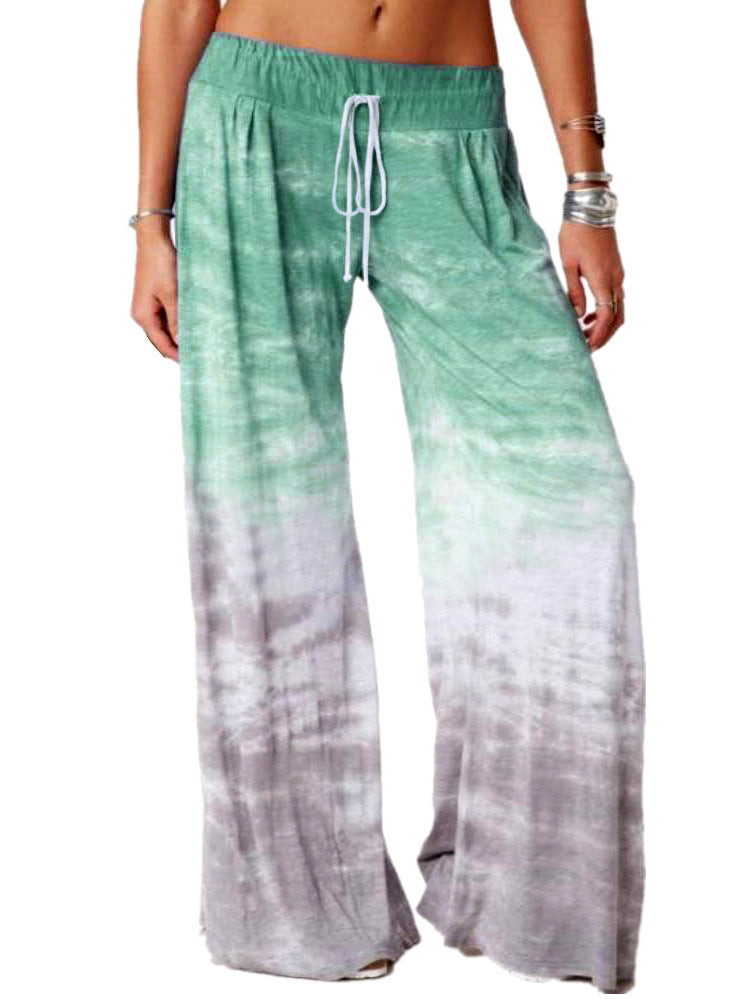 Ladies wide batik pants with drawstring, pleats, and side pockets Mune Fashion