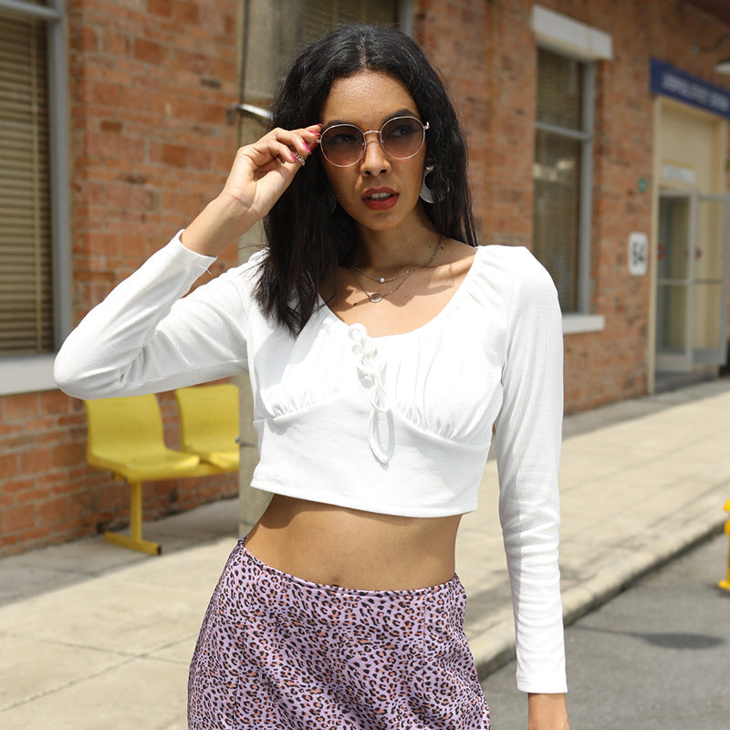 Women's fitted crop top with gathered bustier, boat neckline, and long sleeves Mune Fashion