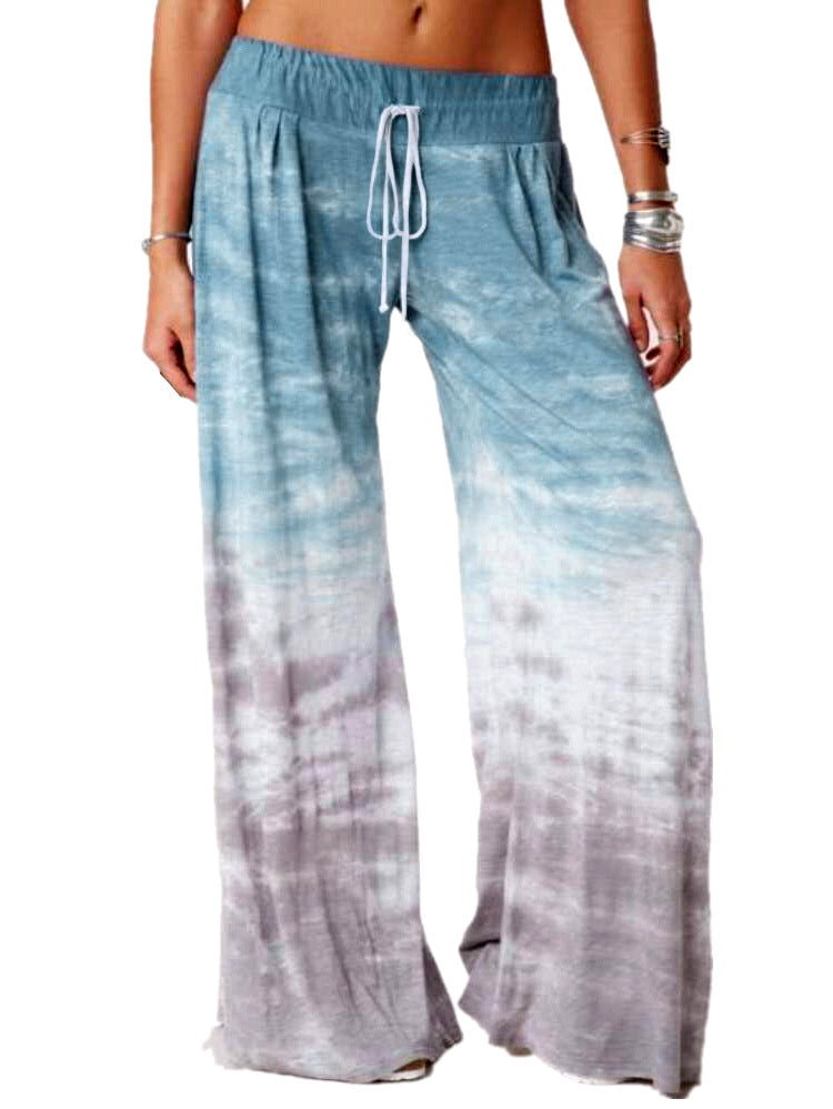 Ladies wide batik pants with drawstring, pleats, and side pockets Mune Fashion