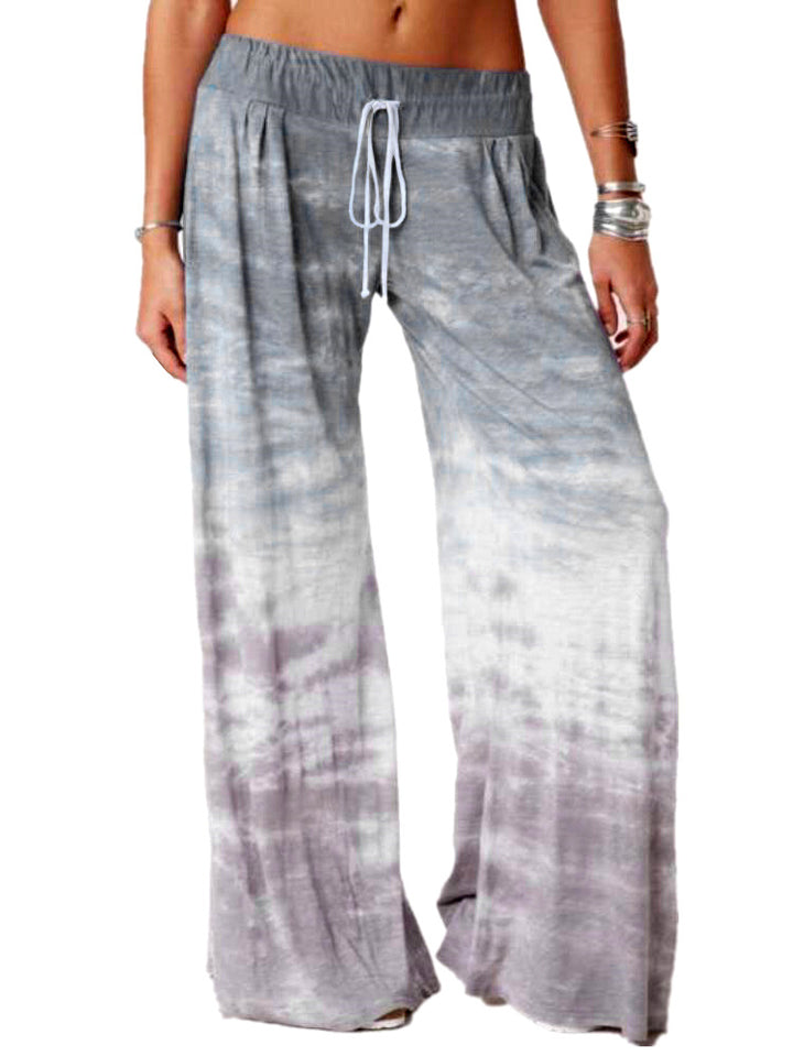 Ladies wide batik pants with drawstring, pleats, and side pockets Mune Fashion