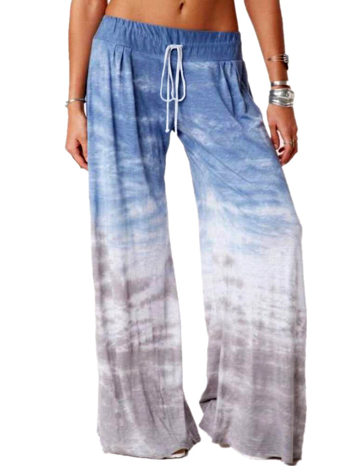 Ladies wide batik pants with drawstring, pleats, and side pockets Mune Fashion