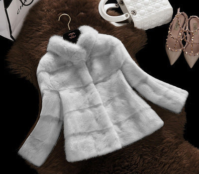 Women's Faux Fur Jacket with Modern Cut and High Collar Mune