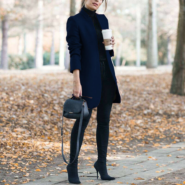 Women's tailored wool blend coat with concealed button placket and shaping darts Mune Fashion