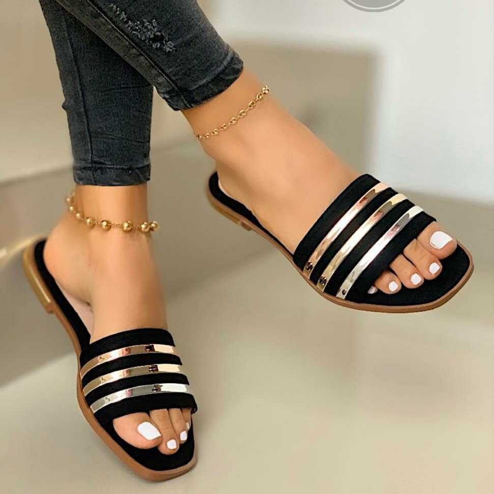 Ladies' flat slip-on sandals with multi-stripe metallic strips and padded comfort footbed Mune Fashion