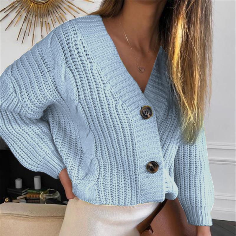 Women’s short cropped chunky knit cardigan with deep V-neck, cable pattern and oversized sleeves Mune Fashion
