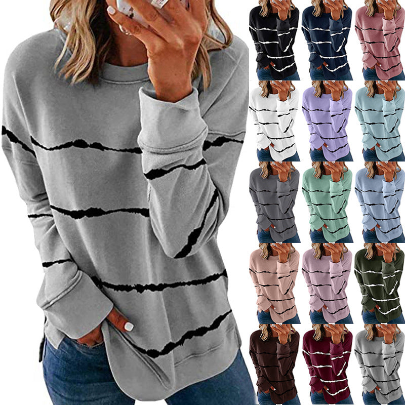 Women's casual oversized sweatshirt with wave-pattern stripes round neck side slits and rounded hem Mune Fashion